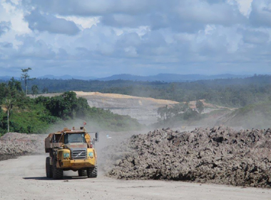 The Volvo articulated hauler is loaded with material.